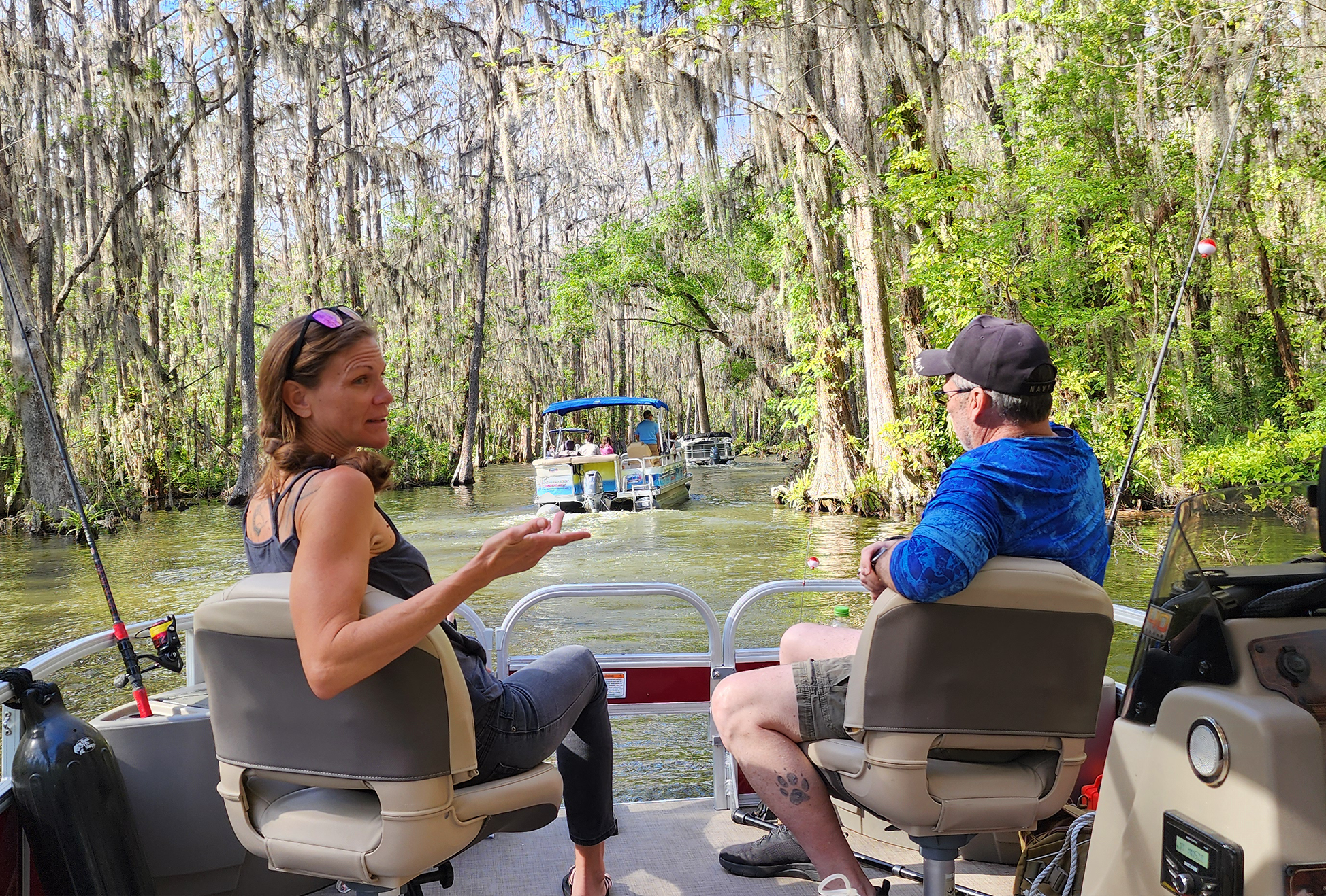 Veterans talking on a pontoon boat